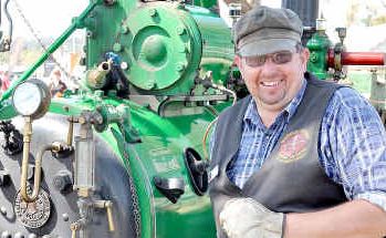 Warren Buckley and a portable steam engine at the Heritage Ag Show at the Toowoomba Showgrounds Warren Buckley and a portable steam engine at the Heritage Ag Show at the Toowoomba Showgrounds
